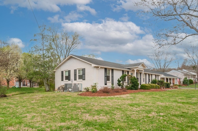 6307 Park Ln, Nashville, TN 37205 - view of front of home with a front yard, brick siding, and central AC
