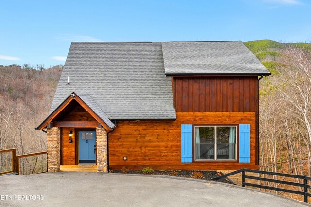 817 Pine Top Ln, Gatlinburg, TN 37738 - view of front of property featuring roof with shingles and stone siding