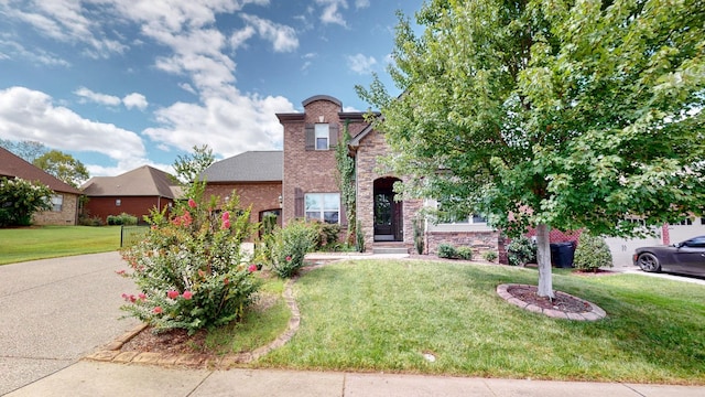 1303 Reynard Dr, Gallatin, TN 37066 - view of front of property featuring a front yard and brick siding