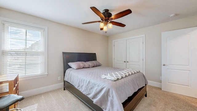 1303 Reynard Dr, Gallatin, TN 37066 - bedroom featuring multiple windows, a closet, light carpet, and baseboards