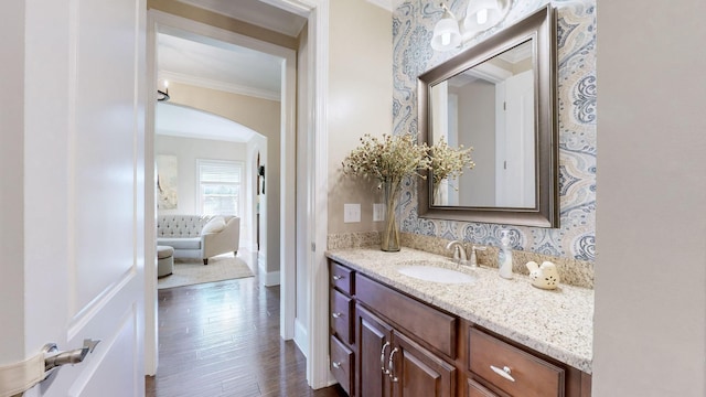 1303 Reynard Dr, Gallatin, TN 37066 - bathroom with crown molding, vanity, wood finished floors, and baseboards