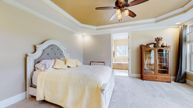 1303 Reynard Dr, Gallatin, TN 37066 - carpeted bedroom featuring a tray ceiling, ornamental molding, baseboards, and ensuite bath