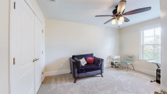 1303 Reynard Dr, Gallatin, TN 37066 - living area with light colored carpet, ceiling fan, and baseboards