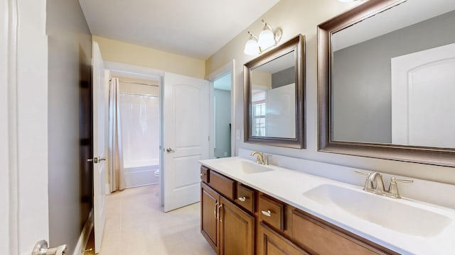 1303 Reynard Dr, Gallatin, TN 37066 - bathroom with double vanity and shower / tub combo