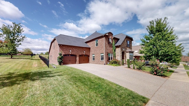 1303 Reynard Dr, Gallatin, TN 37066 - view of front of house with brick siding, an attached garage, concrete driveway, and a shingled roof