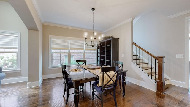 1303 Reynard Dr, Gallatin, TN 37066 - dining area featuring a chandelier, dark wood-style flooring, stairway, and crown molding
