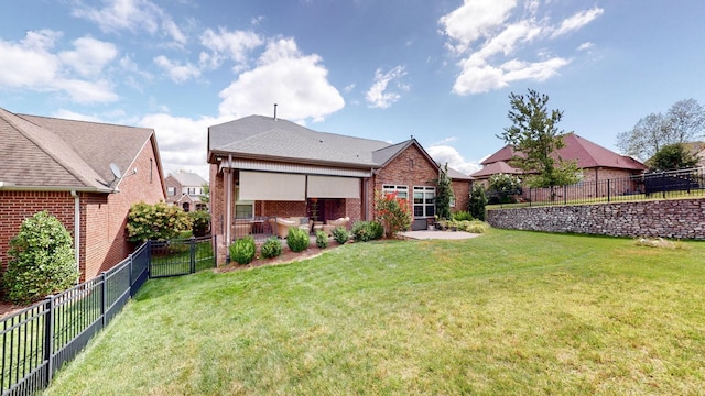 1303 Reynard Dr, Gallatin, TN 37066 - rear view of property with brick siding and a patio