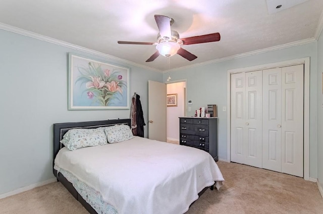 262 Purdy Rd, Selmer, TN 38375 - bedroom with light carpet, ornamental molding, a closet, a ceiling fan, and baseboards