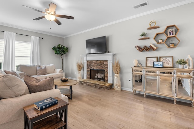 6787 Dharma Loop, Chattanooga, TN 37412 - living room with ornamental molding, ceiling fan, light wood-type flooring, baseboards, and a fireplace