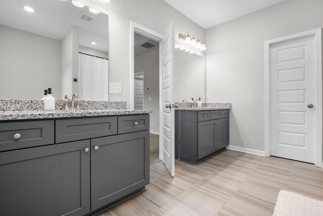 6787 Dharma Loop, Chattanooga, TN 37412 - bathroom with two vanities and baseboards