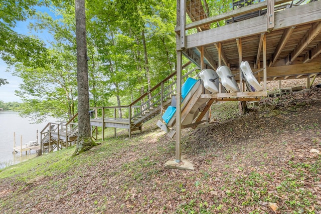 4053 Deer Creek Rd, Linden, TN 37096 - view of yard featuring stairway and a deck with water view