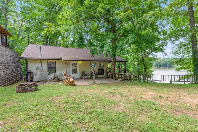 4053 Deer Creek Rd, Linden, TN 37096 - back of house with a water view, a patio area, a fire pit, and a shingled roof