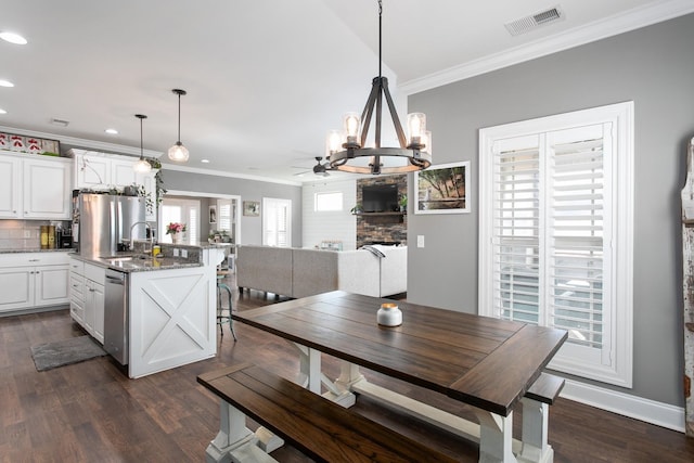 2466 Cason Ln, Murfreesboro, TN 37128 - dining space featuring ornamental molding, recessed lighting, dark wood-style floors, a chandelier, and a ceiling fan