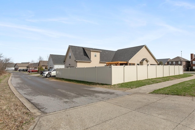 2466 Cason Ln, Murfreesboro, TN 37128 - view of side of home with a residential view and a shingled roof
