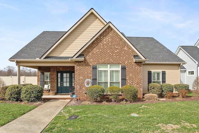 2466 Cason Ln, Murfreesboro, TN 37128 - view of front facade featuring brick siding, covered porch, and roof with shingles
