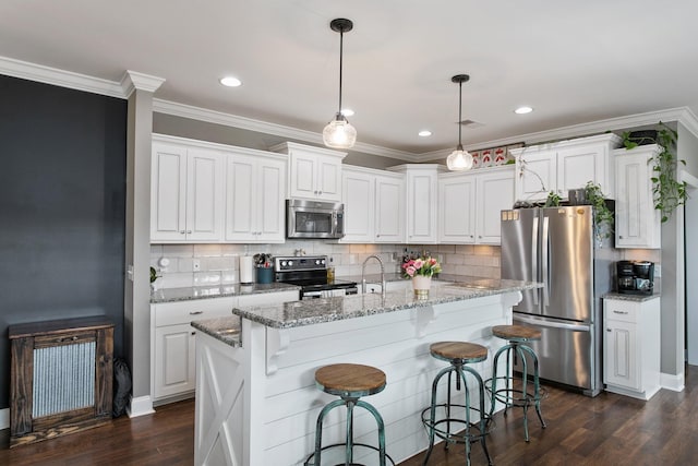 2466 Cason Ln, Murfreesboro, TN 37128 - kitchen featuring stainless steel appliances, dark wood-style flooring, white cabinets, decorative backsplash, and a breakfast bar area