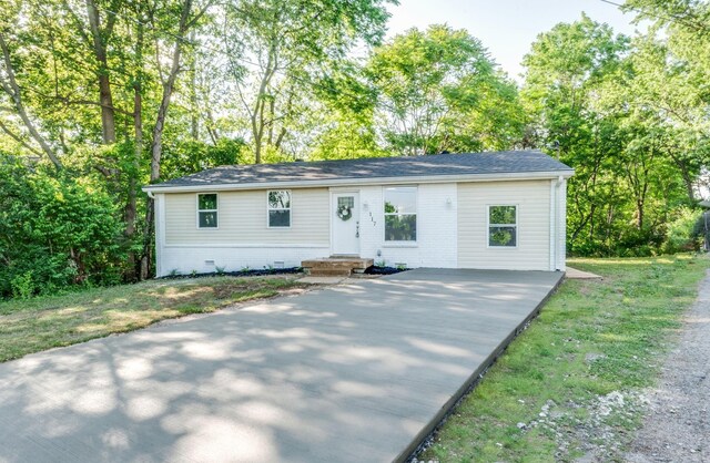 117 Apollo Ct W, Antioch, TN 37013 - ranch-style house featuring driveway and brick siding