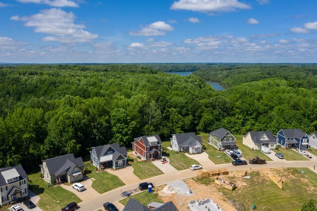 301 Evans Dr, Tullahoma, TN 37388 - aerial view of residential area with a forest and a large body of water