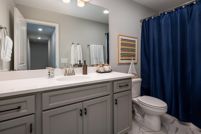 301 Evans Dr, Tullahoma, TN 37388 - bathroom featuring marble finish floors, toilet, vanity, recessed lighting, and a shower with shower curtain