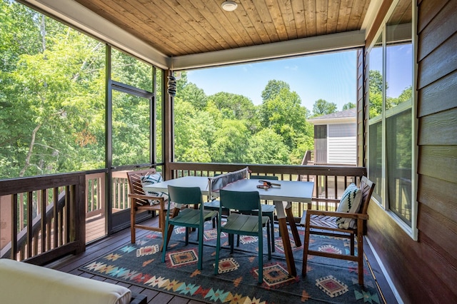 301 Evans Dr, Tullahoma, TN 37388 - wooden deck with outdoor dining area and a wooded view