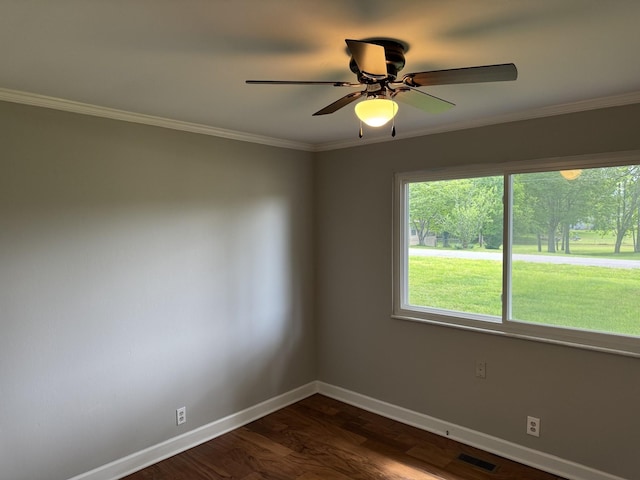 2306 Raspberry Ln, Lebanon, TN 37087 - spare room with baseboards, dark wood-style floors, ornamental molding, and ceiling fan