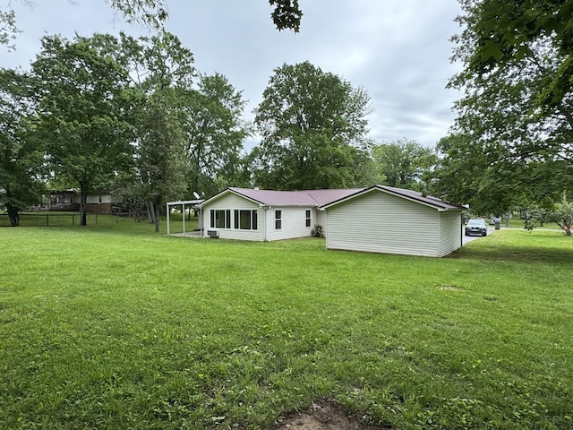 2306 Raspberry Ln, Lebanon, TN 37087 - back of property featuring a yard