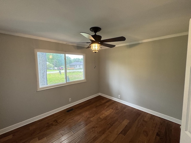 2306 Raspberry Ln, Lebanon, TN 37087 - spare room featuring ornamental molding, dark wood-style floors, baseboards, and ceiling fan
