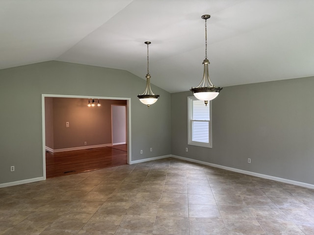 2306 Raspberry Ln, Lebanon, TN 37087 - empty room featuring vaulted ceiling and baseboards