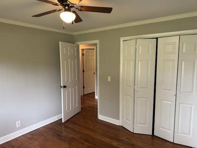 2306 Raspberry Ln, Lebanon, TN 37087 - unfurnished bedroom featuring baseboards, crown molding, dark wood finished floors, a closet, and a ceiling fan