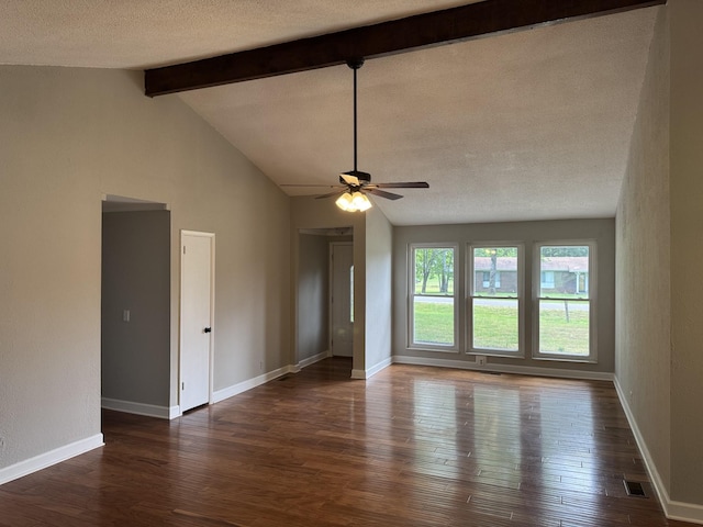 2306 Raspberry Ln, Lebanon, TN 37087 - unfurnished living room featuring ceiling fan, dark wood-style flooring, a textured ceiling, and baseboards