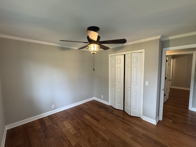 2306 Raspberry Ln, Lebanon, TN 37087 - unfurnished bedroom featuring baseboards, a closet, ornamental molding, dark wood-style floors, and ceiling fan