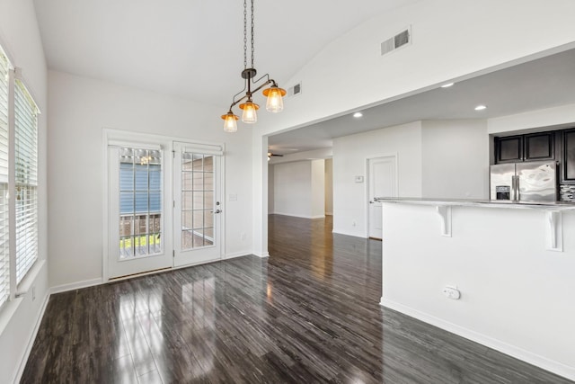 2003 Allerton Way, Spring Hill, TN 37174 - unfurnished living room featuring dark wood-type flooring, vaulted ceiling, baseboards, and recessed lighting