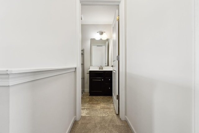2003 Allerton Way, Spring Hill, TN 37174 - hall featuring light colored carpet, a sink, and baseboards