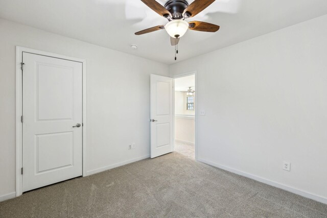 2003 Allerton Way, Spring Hill, TN 37174 - unfurnished bedroom with carpet flooring, baseboards, and ceiling fan