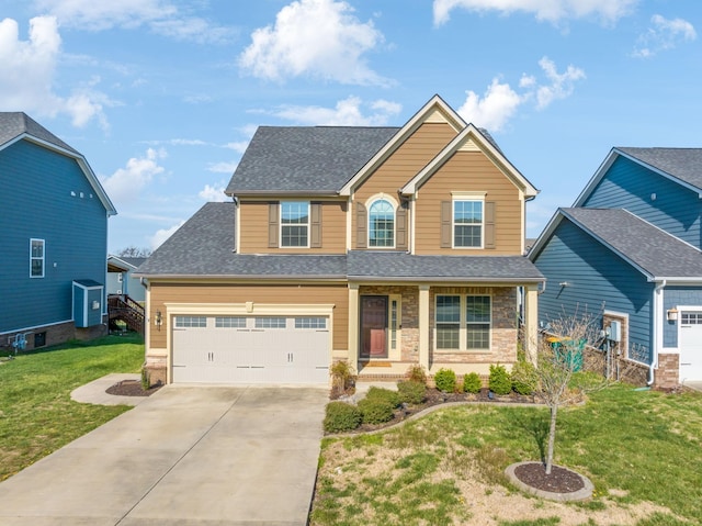 2003 Allerton Way, Spring Hill, TN 37174 - view of front of home featuring concrete driveway, a front yard, a shingled roof, covered porch, and stone siding