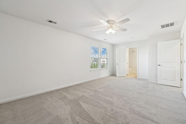 2003 Allerton Way, Spring Hill, TN 37174 - unfurnished bedroom featuring baseboards, light colored carpet, connected bathroom, and a ceiling fan