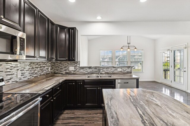 2003 Allerton Way, Spring Hill, TN 37174 - kitchen featuring stainless steel appliances, a sink, decorative backsplash, dark wood-style flooring, and recessed lighting