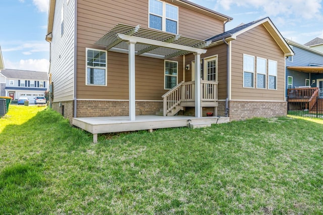 2003 Allerton Way, Spring Hill, TN 37174 - back of property with brick siding, a pergola, and a yard