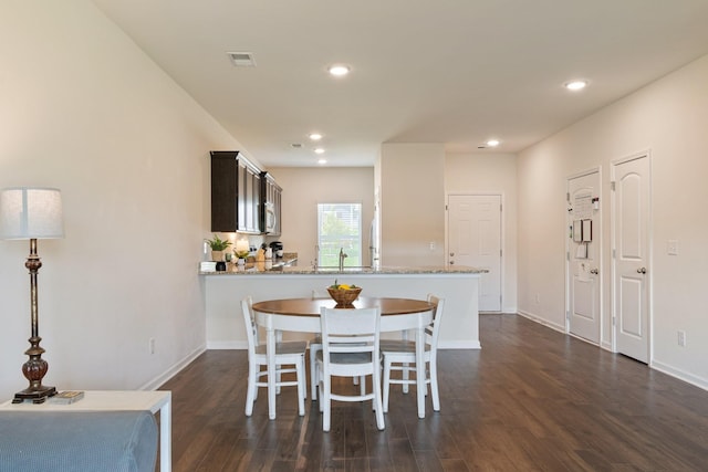 2555 Queen Bee Dr, Columbia, TN 38401 - dining room with dark wood finished floors and recessed lighting