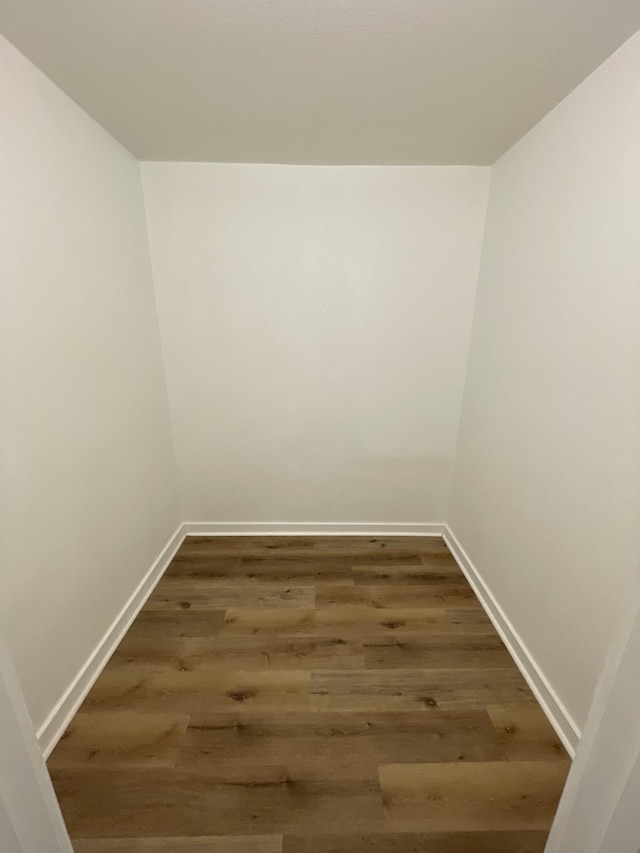119 Maple Ave, Camden, TN 38320 - empty room with baseboards and wood finished floors