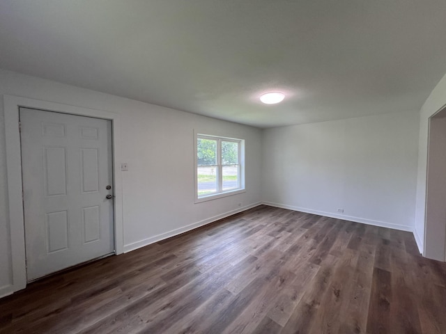 119 Maple Ave, Camden, TN 38320 - foyer entrance featuring dark wood-style flooring