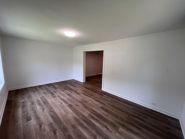 119 Maple Ave, Camden, TN 38320 - unfurnished room featuring dark wood-type flooring