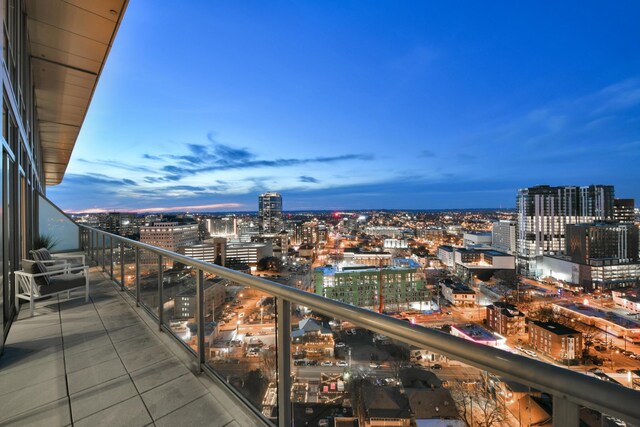 900 20th Ave S Unit 1601, Nashville, TN 37212 - balcony at dusk with a view of city