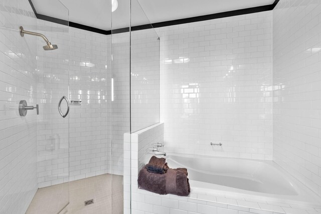 900 20th Ave S Unit 1601, Nashville, TN 37212 - bathroom with tiled shower and tiled bath