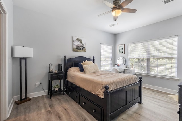 7234 Althorp Way Unit U8, Nashville, TN 37211 - bedroom with baseboards, light wood-style floors, and ceiling fan