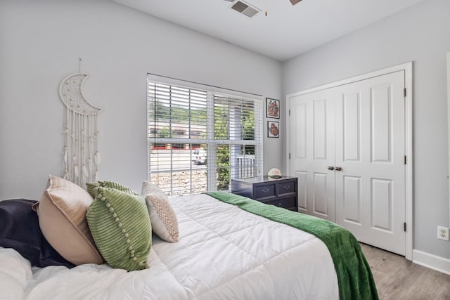 7234 Althorp Way Unit U8, Nashville, TN 37211 - bedroom with light wood finished floors, a closet, baseboards, and ceiling fan