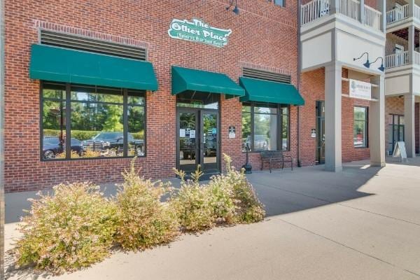 7234 Althorp Way Unit U8, Nashville, TN 37211 - view of exterior entry featuring brick siding