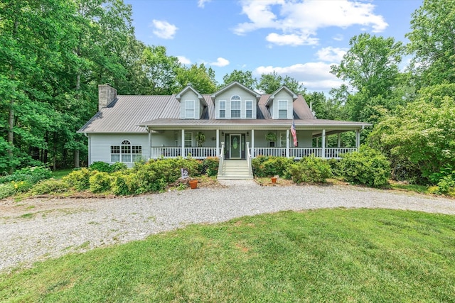 366 June Chapel Rd, Cookeville, TN 38506 - view of front of home with covered porch, driveway, a front lawn, and a chimney