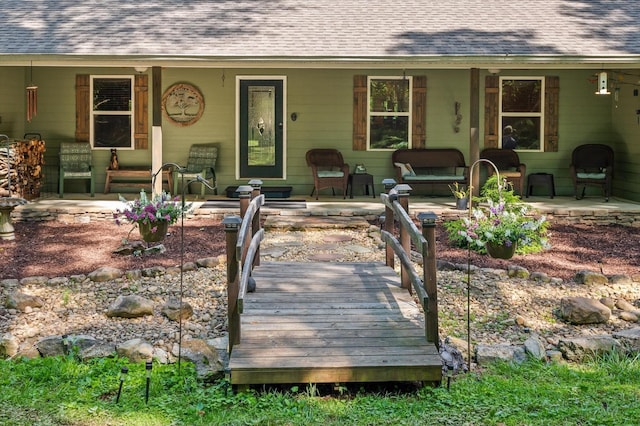 204 Chapman Ct, La Fayette, GA 30728 - doorway to property with roof with shingles and a porch