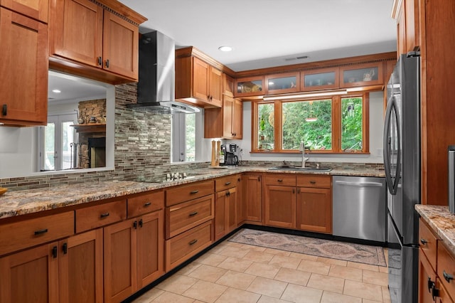 204 Chapman Ct, La Fayette, GA 30728 - kitchen with a sink, stainless steel appliances, wall chimney range hood, brown cabinets, and backsplash